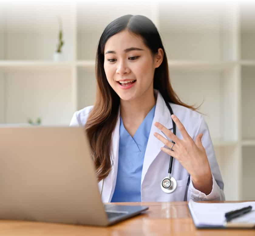 Doctor working at a laptop